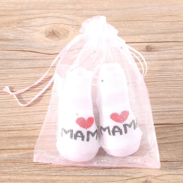Nyfødt sokker, Love mama